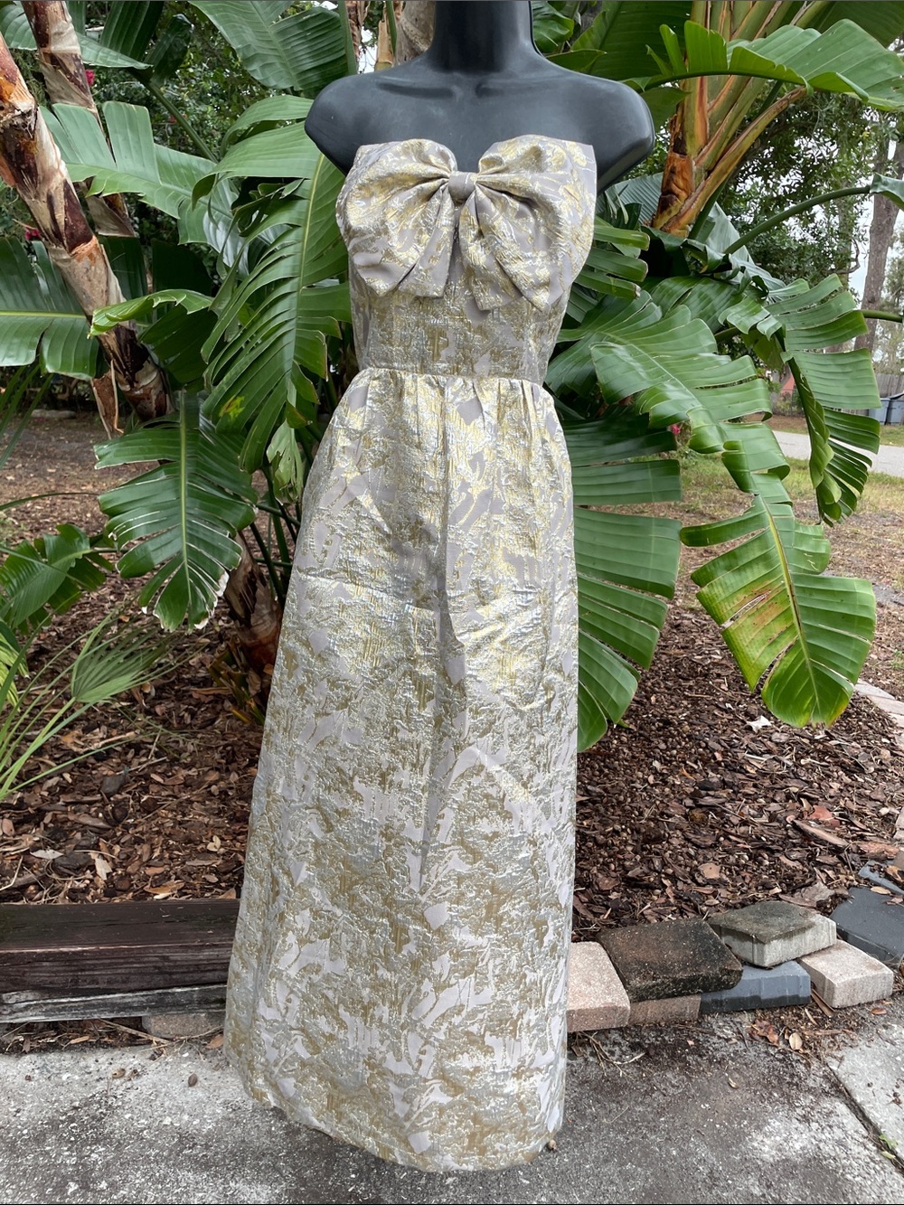 strapless, gold and silver brocade J Marie dress with a large front bow
